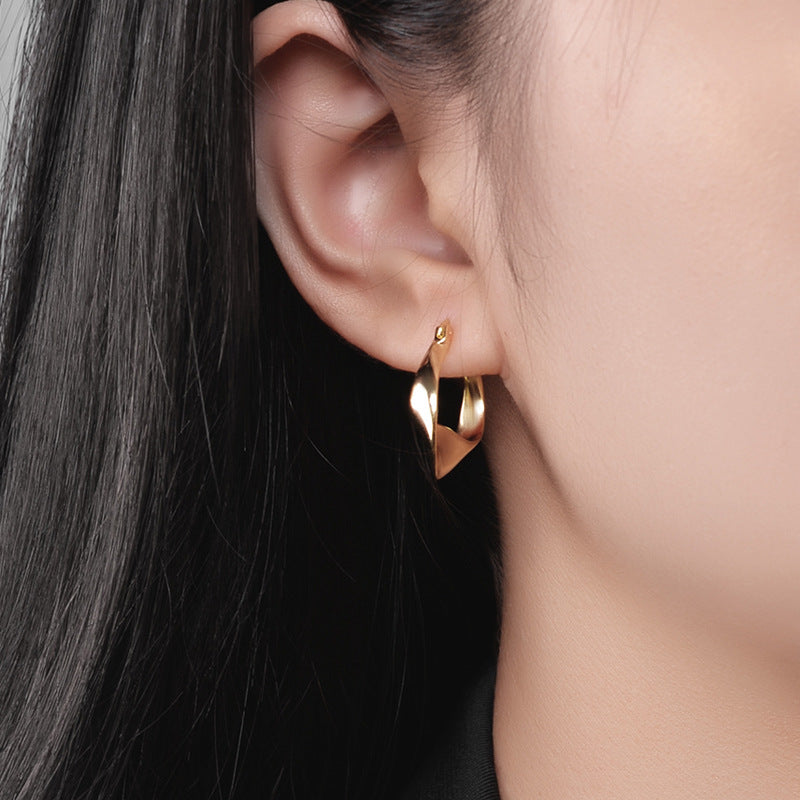 Glossy Twisted Huggie Earring – Silver & Gold Korean Style