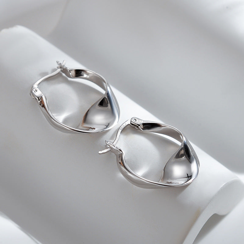 Glossy Twisted Huggie Earring – Silver & Gold Korean Style