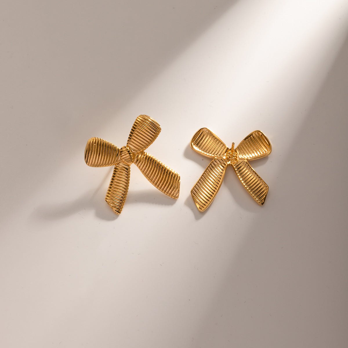 Gold Bow Stud Earrings - Luxury Minimalist Statement Piece