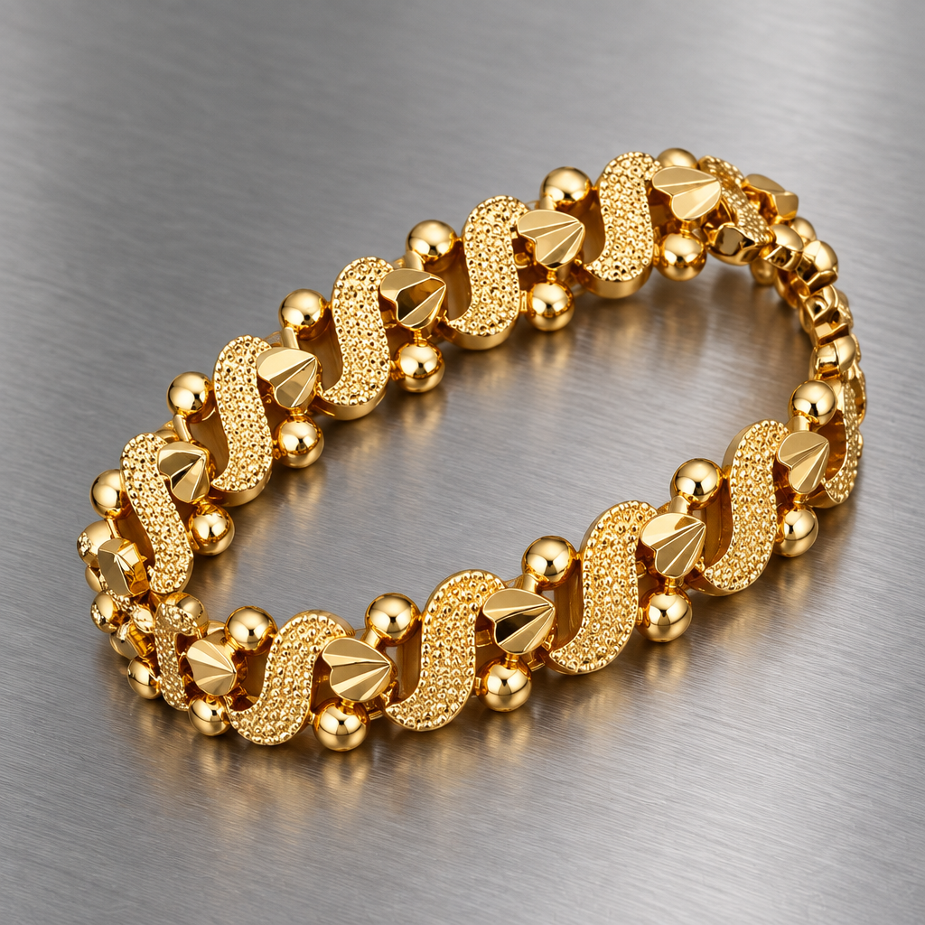 Gold-tone decorative bracelet with textured links on brushed steel