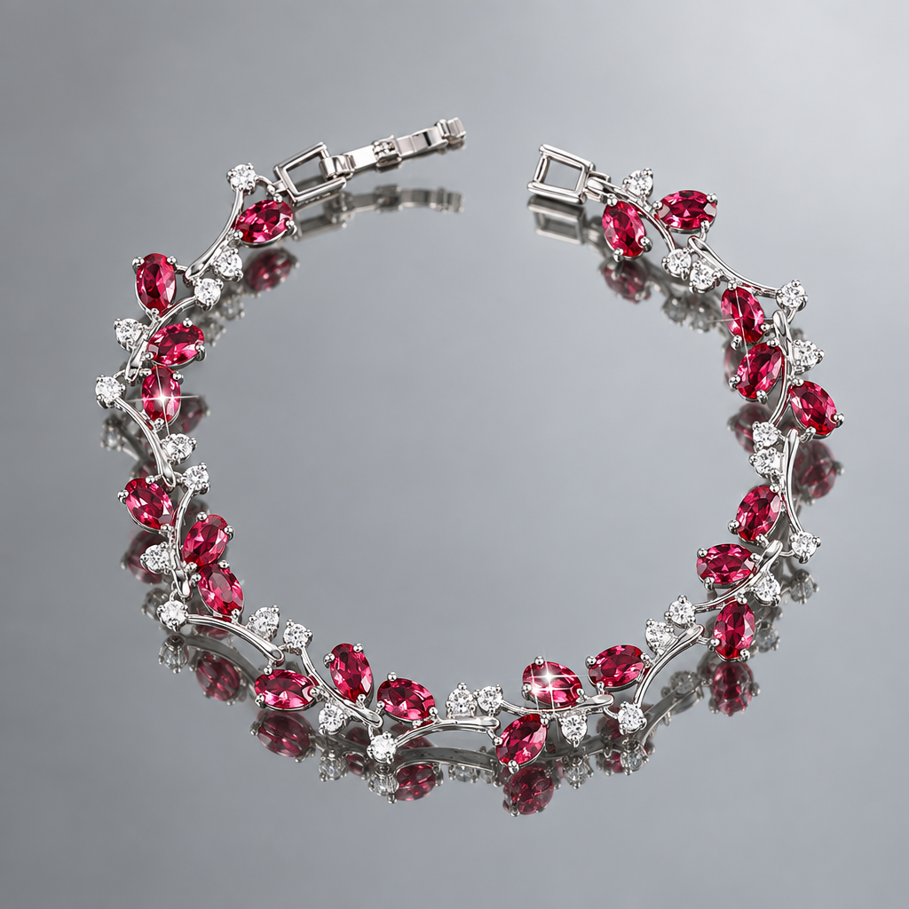 Silver-tone botanical bracelet with red marquise stones reflected in a mirror