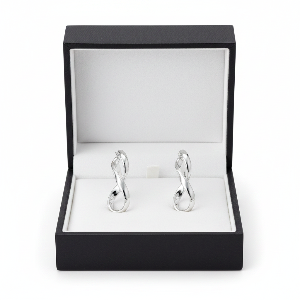 Silver infinity hoop earrings in luxury jewelry box