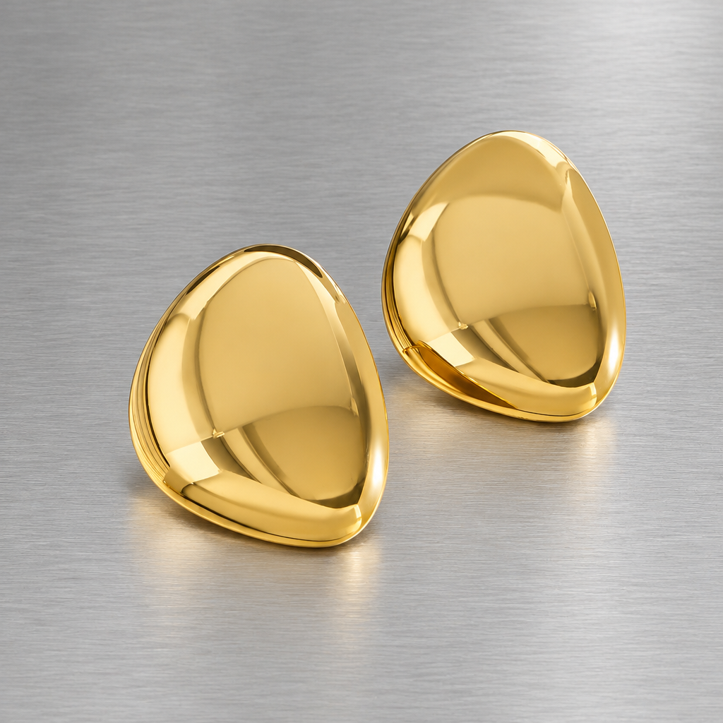 Pair of Carrie gold-tone rounded triangular earrings on brushed steel