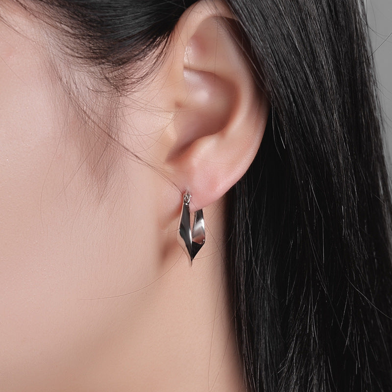 Glossy Twisted Huggie Earring – Silver & Gold Korean Style