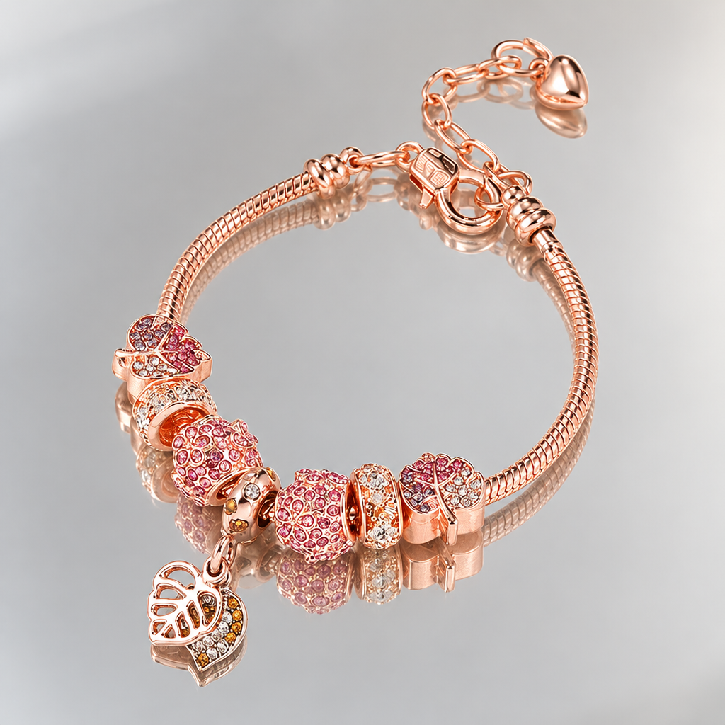 Fallen Leaf rose gold-tone charm bracelet with pink beads reflected in a mirror