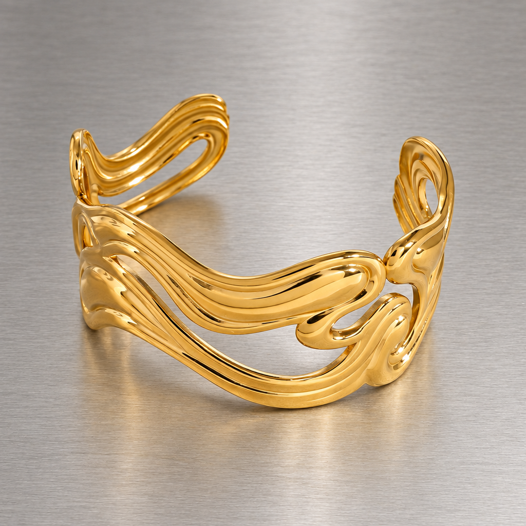Anissa gold-tone wavy open cuff bracelet on brushed steel